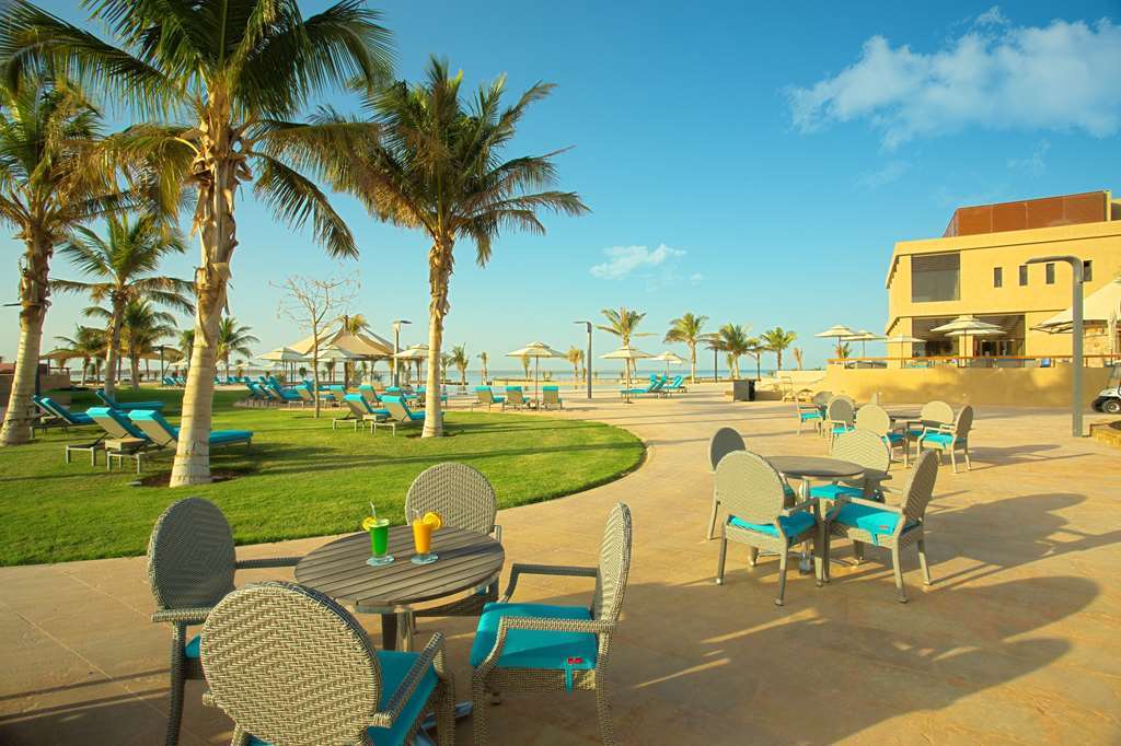 Golden Tulip Sharma Resort Nhà hàng bức ảnh