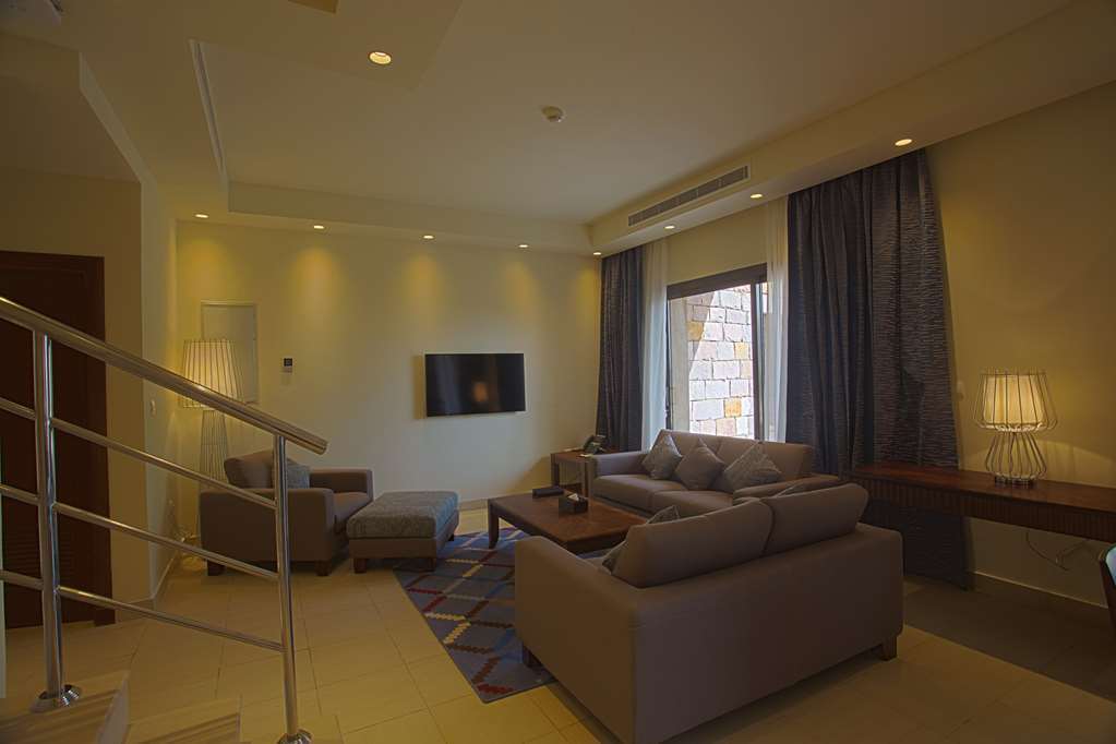 Golden Tulip Sharma Resort Phòng bức ảnh