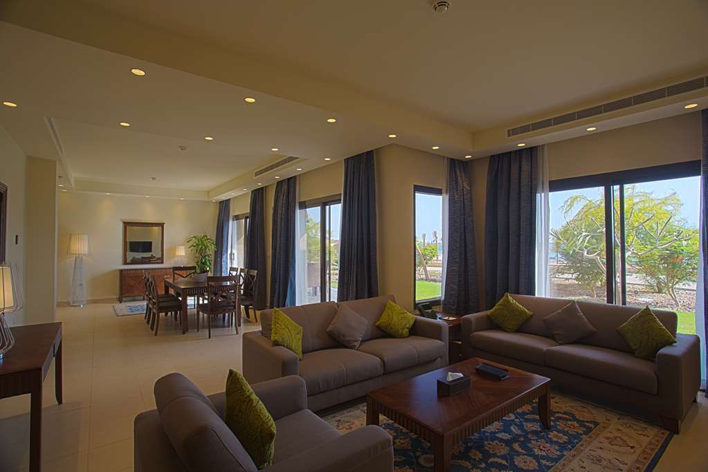 Golden Tulip Sharma Resort Phòng bức ảnh