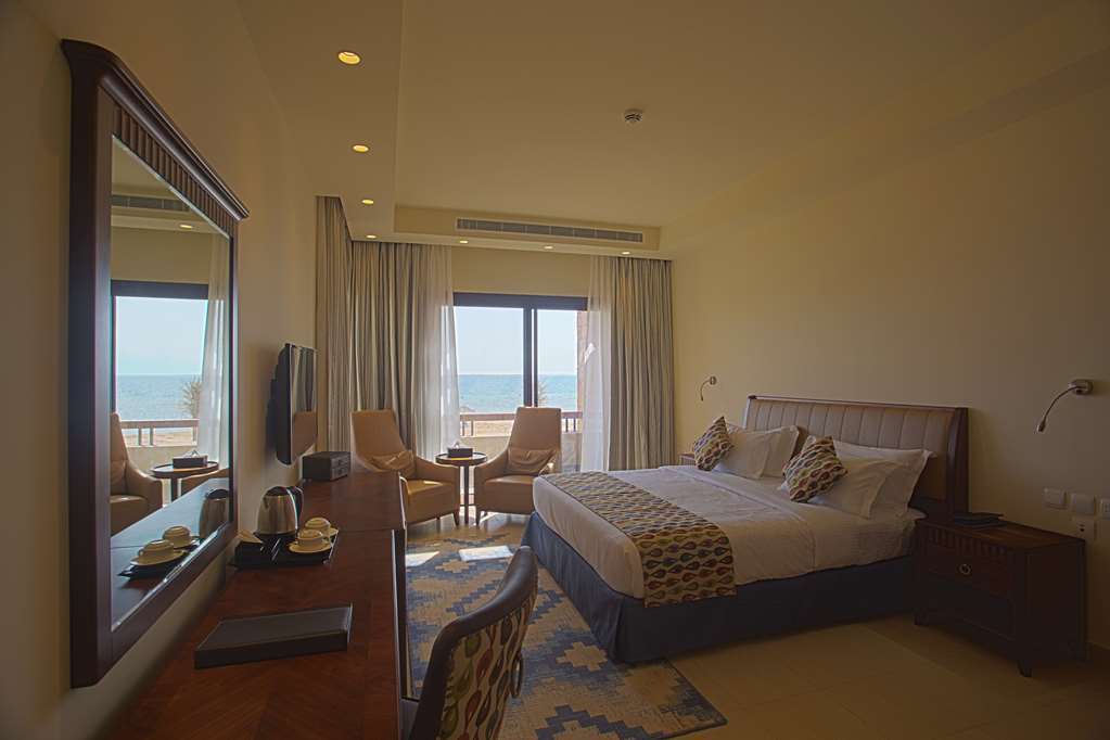 Golden Tulip Sharma Resort Phòng bức ảnh