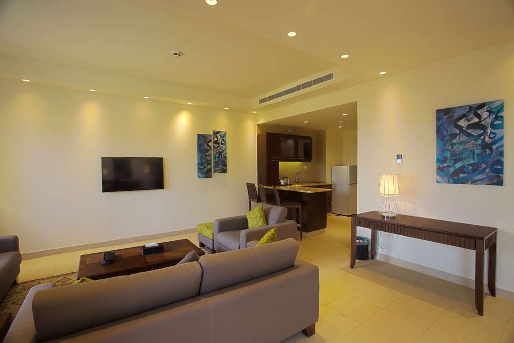 Golden Tulip Sharma Resort Phòng bức ảnh