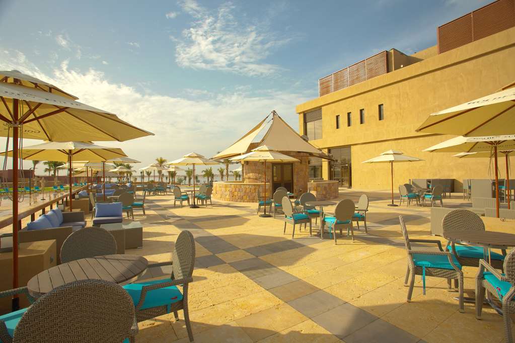 Golden Tulip Sharma Resort Nhà hàng bức ảnh