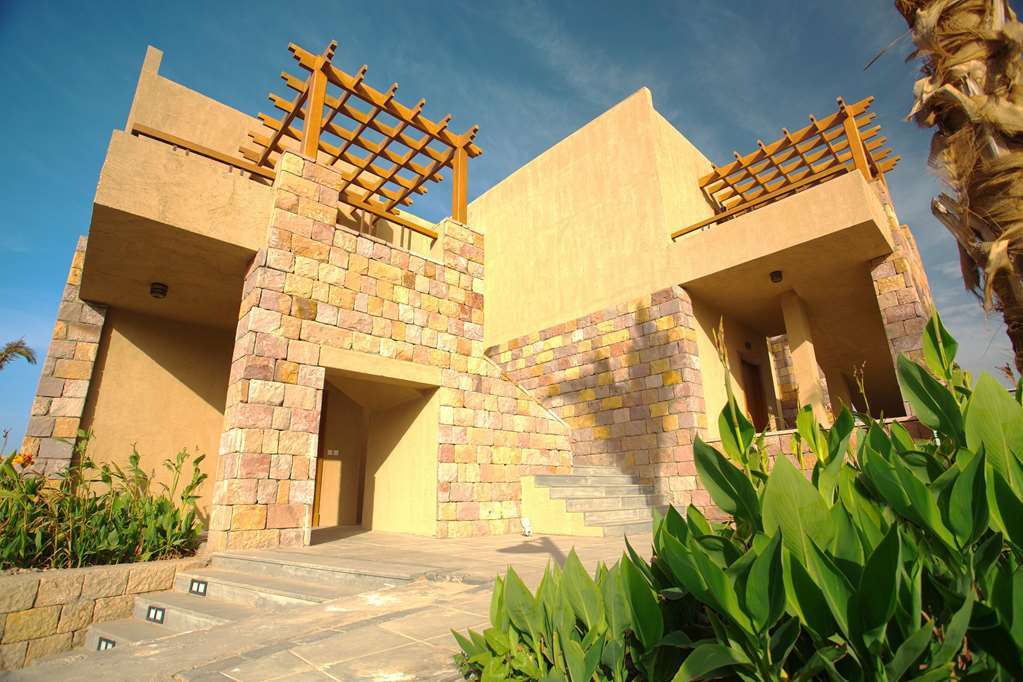 Golden Tulip Sharma Resort Phòng bức ảnh