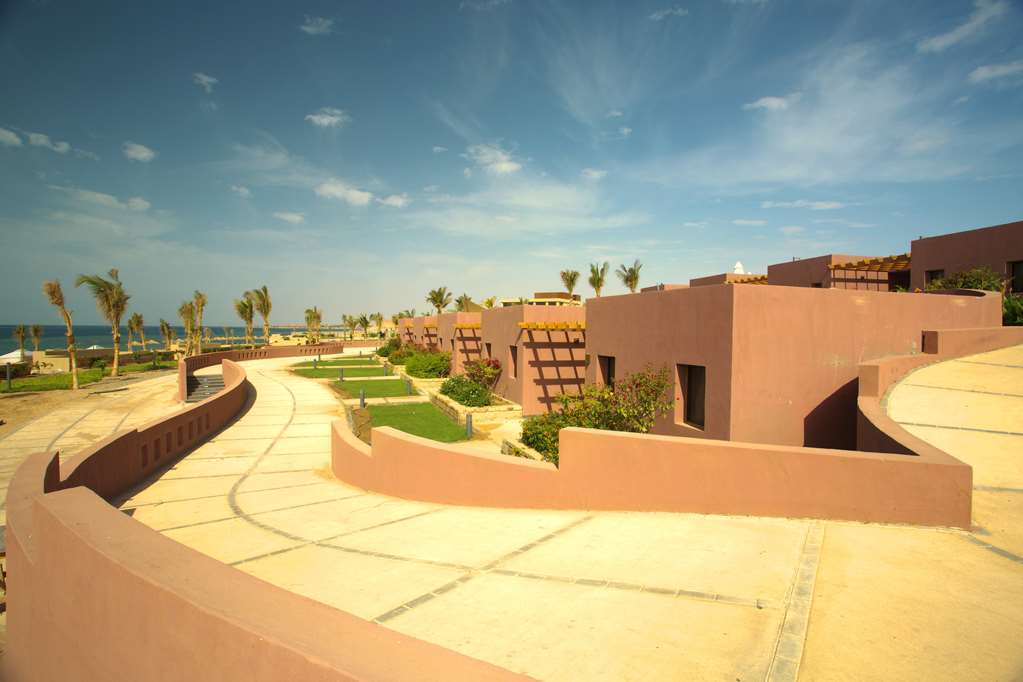 Golden Tulip Sharma Resort Phòng bức ảnh