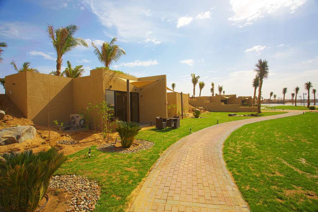 Golden Tulip Sharma Resort Phòng bức ảnh