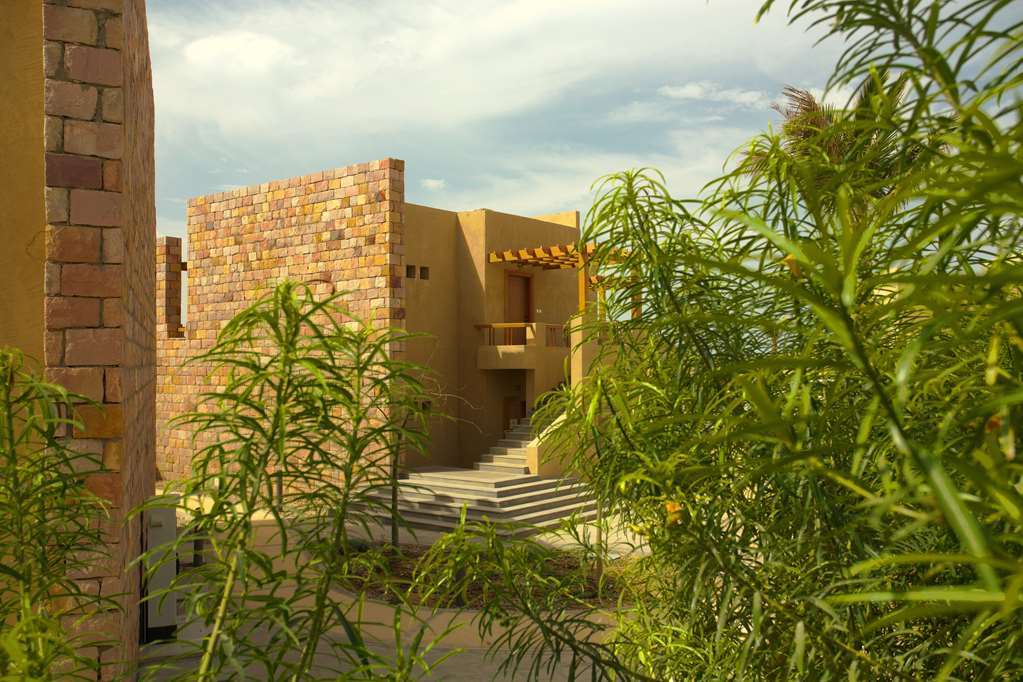 Golden Tulip Sharma Resort Phòng bức ảnh